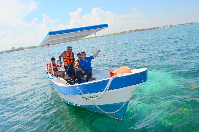 Catamaran Sail and Snorkeling Tour with Open Bar in Puerto Morelos - The catamaran ride, bar service, and group atmosphere