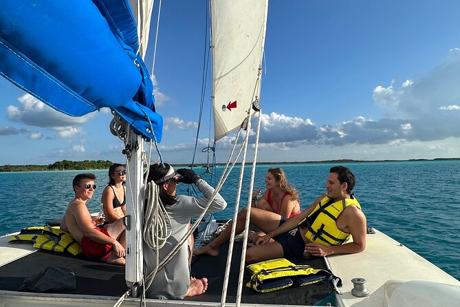 Catamaran Sailboat Bacalar Excursions - Four hours across Bacalar’s seven-color water