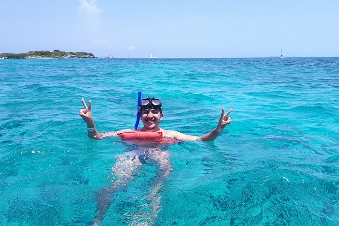 Catamaran Sailing and Snorkeling to Isla Mujeres from Cancun - Optional spinnaker flying over the sea