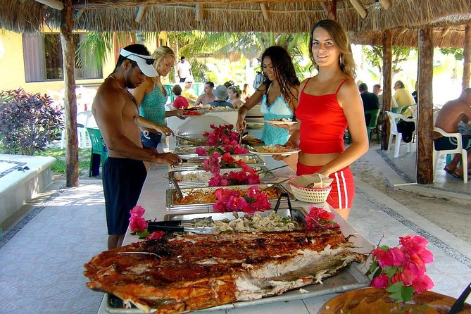 Catamaran Sailing and Snorkeling to Isla Mujeres from Cancun - Arriving at Isla Mujeres and the beach club