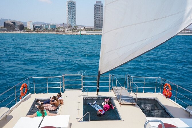 Catamaran Sailing Cruise in Barcelona - Port Vell, yachts, and the World Trade Center