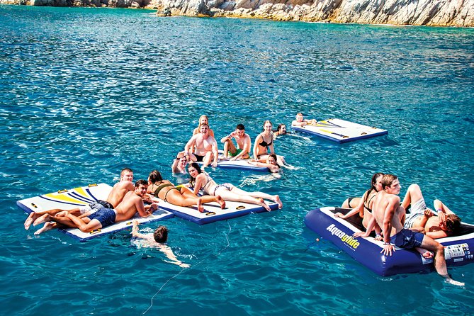 Catamaran trip with other groups along the Costa Brava. Saturday. - Anchoring near a rocky cove