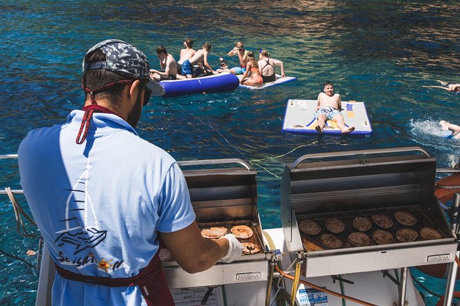 Catamaran trip with other groups along the Costa Brava. Saturday. - Lunch cooked aboard the catamaran