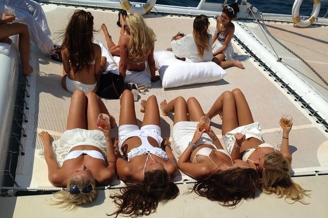 Catamaran trip with other groups along the Costa Brava. Saturday. - Cruising the Costa Brava coastline