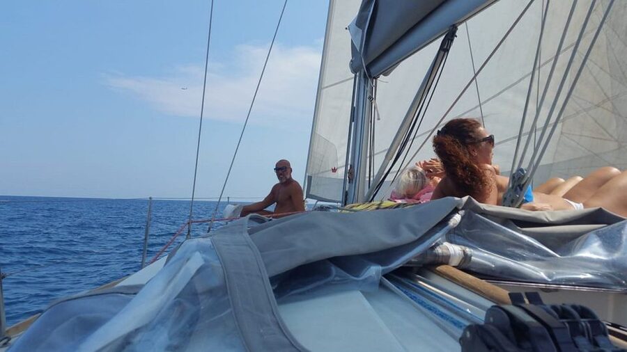Catania: Coastline Sailing Trip 6hr with Aperitif and Lunch - Acicastello and its medieval castle