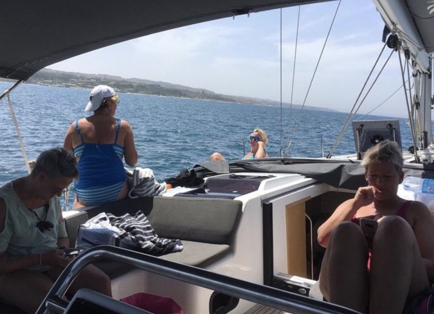 Catania: Sailing Tour with Lunch - Swimming and snorkeling in clear water