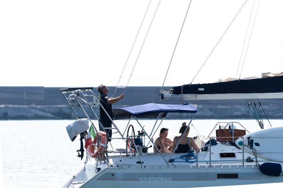 Catania: Sunset Sailing Tour with Sicilian Aperitif - Following Catania’s Black Lava Coast
