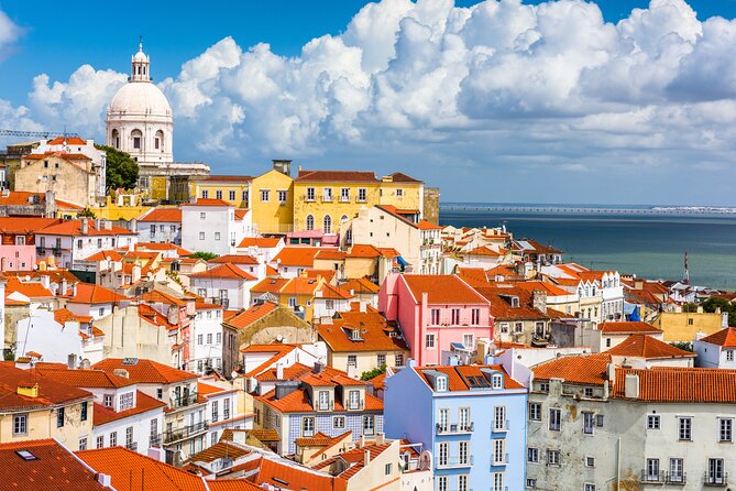 Charms of Lisbon: Alfama Tapas Tour & Sunset Sailing with Wine - Setting out on the Tagus at sunset