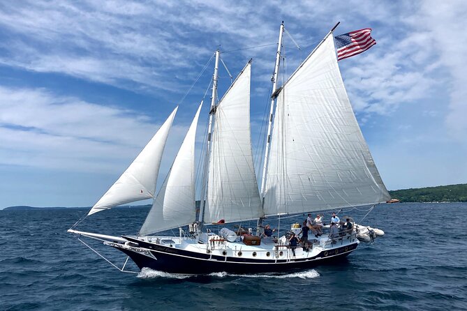 Day Sail from Traverse City with Food, Wine, & Cocktails - Raising the sails and taking the helm