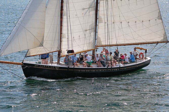 Day Sails and Sunset tours on Schooner Surprise in Camden Maine - Passing Curtis Island Lighthouse and the Camden Coast