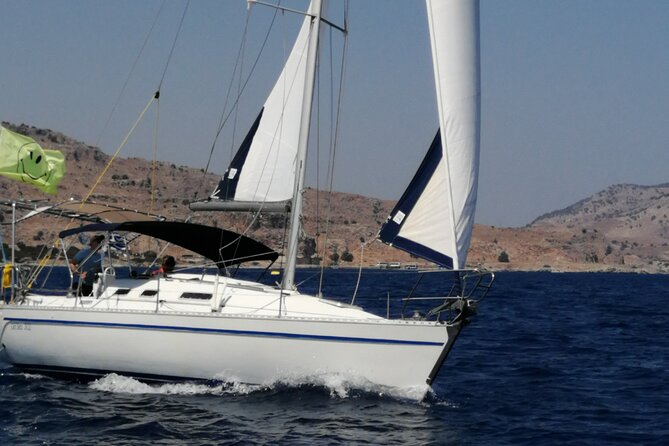 Daytour Sailboat with Lunch/drinks in Lindos area - A captain-led trip with room to participate