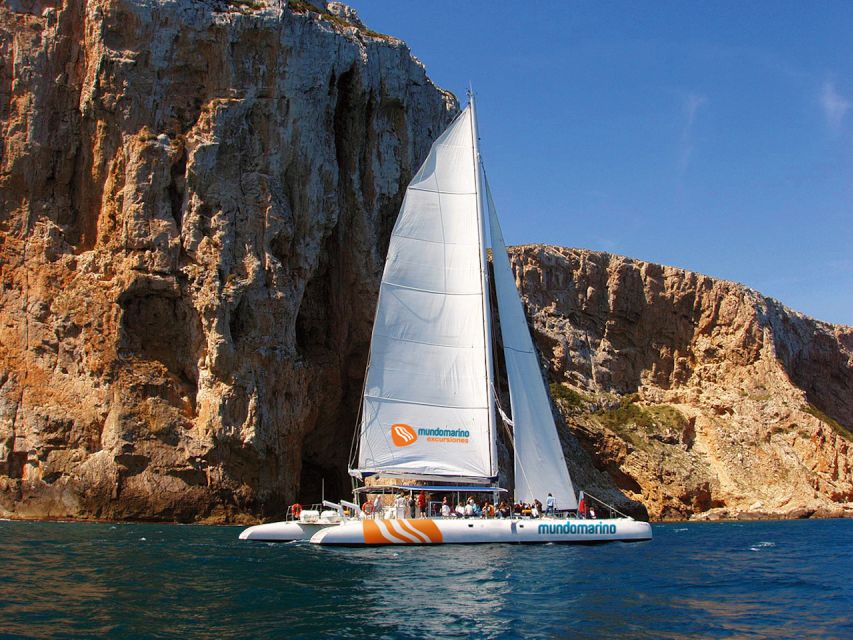 Dénia & Jávea: Portixol Sailing Catamaran Excursion with BBQ - The swimming stop from the boat