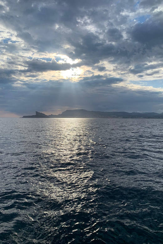 Departure from BRUSC sunset on sailing catamaran - Leaving Brusc as the Evening Begins