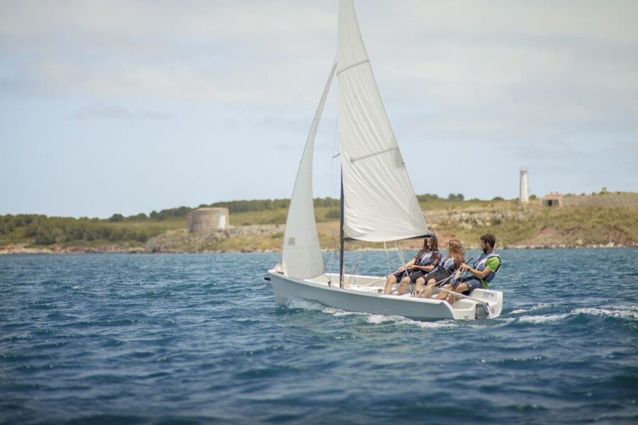 Dinghy Sailing Lesson in Menorca - Learning to Sail on Fornells Bay