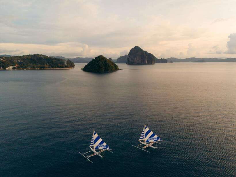 El Nido Islands: Shared Paraw Day Sailing with Lunch - Sailing beneath Bacuit Bay’s limestone cliffs