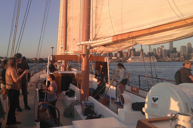 Evening Colors Sunset Sail Tour in Seattle - Drinks, sunset light, and a possible cannon salute