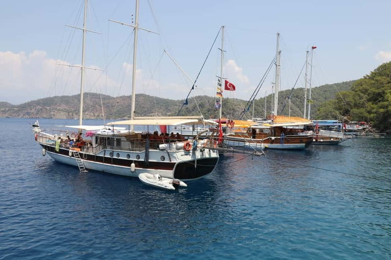 Fethiye: Island Sailing Trip with Lunch and Hotel Pickup - Göcek Island lunch beside turquoise water