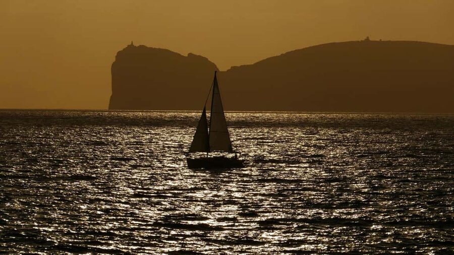 From Alghero: sunset on a sailing boat with aperitif - Who should book this Alghero evening