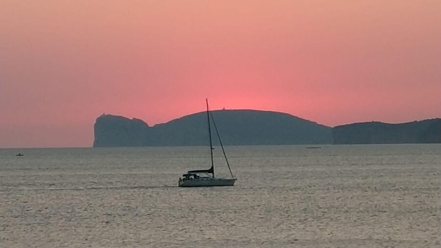 From Alghero: sunset on a sailing boat with aperitif - Sunset near Capo Caccia