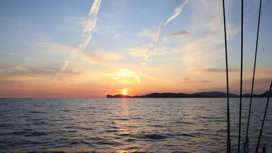 From Alghero: sunset on a sailing boat with aperitif - Meeting skipper Sergio at the Libeccio jetty