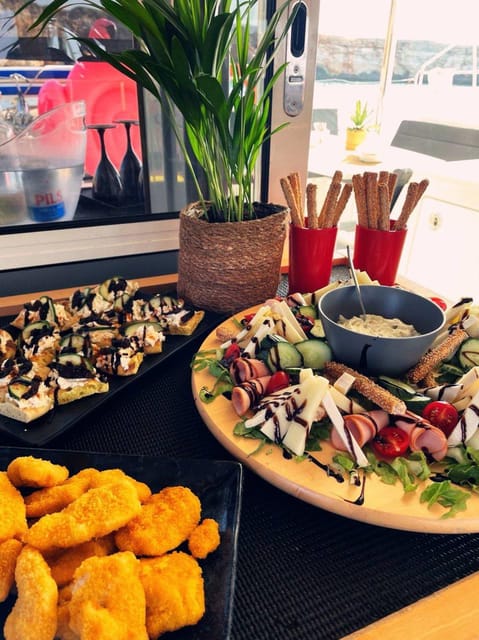 From Panormo: Private Sailing Catamaran Cruise with Lunch - A Mediterranean lunch served on board