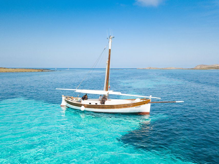 From Stintino: Asinara Vintage Sailing Boat Tour with Lunch - Cala Reale, quarantine buildings and white donkeys