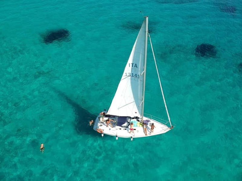 From Stintino: Half-Day Sailing Boat Tour to La Pelosa - Sailing toward La Pelosa and Asinara