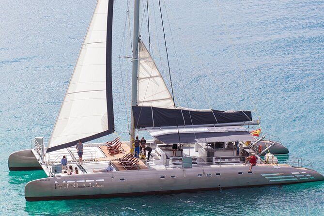 Fuerteventura: Day at Sea on a Sailing Catamaran with Lunch and Drinks - Chicken, rice, and drinks on deck
