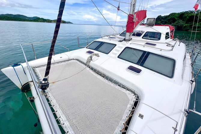 Full-Day Catamaran Sailing Caribbean Beaches with Snorkelling and Lunch - Expect a small boat and a friendly crew
