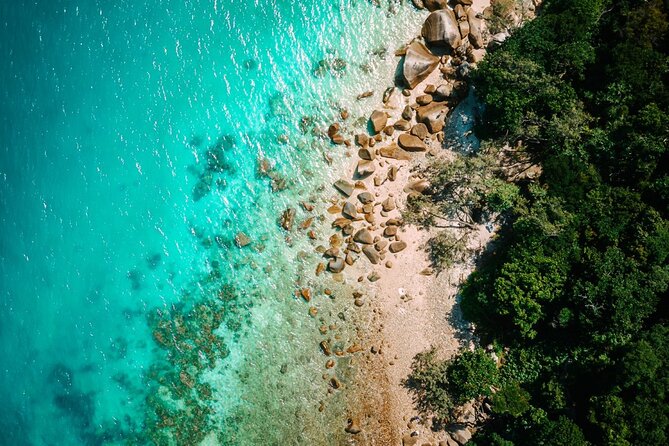 Full-Day Great Barrier Reef Sailing Trip from Cairns - Equipment, Exposure Suits, and Swimming Ability