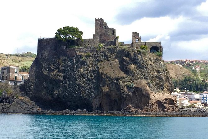 Full Day Sailing Tour Catania-Acitrezza - Sailing, swimming, and the fun of taking the wheel