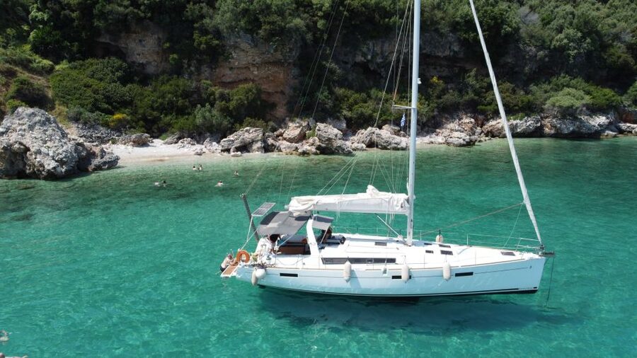 Gouvia: Corfu Island Sailing Trip with Snack and Soft Drinks - Gialiskari brings swimming, snorkeling, and cliff jumping