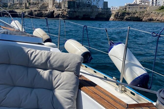 Group tour by sailing boat in Polignano a Mare - Swimming in clear water, with a SUP and snorkeling gear