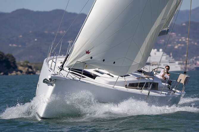 Ibiza Midday or Sunset Sailing with Light Snacks and Open Bar - Reading the west coast from the water
