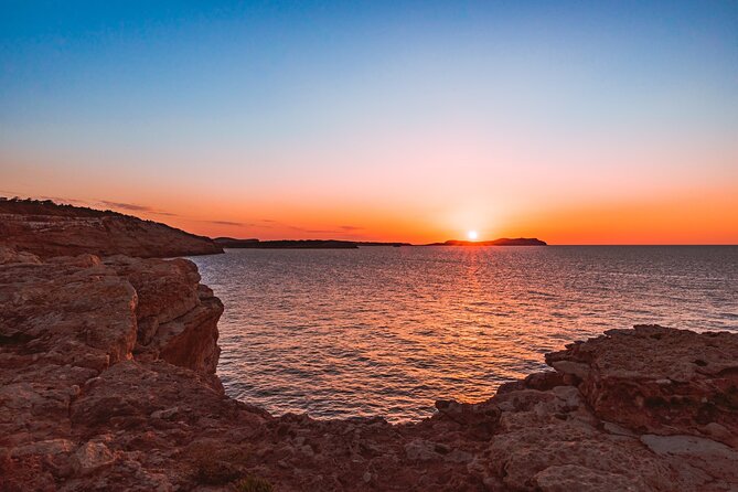 Ibiza Midday or Sunset Sailing with Light Snacks and Open Bar - The swim stop: snorkeling, paddleboards, and quiet water