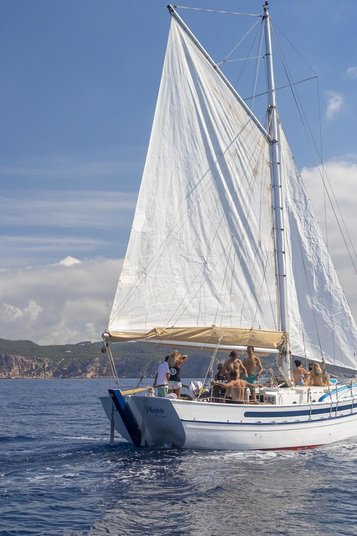 Ibiza: Private Sailboat with Premium Open Bar, Food & Music - Food, drinks, music, and the covered dining area
