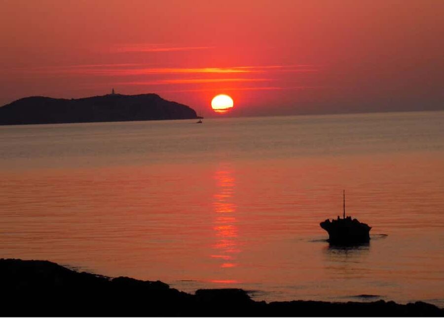 Ibiza: Sunset Private Sailboat with Tapas & Premim Open Bar - Cala Bassa brings the first water stop
