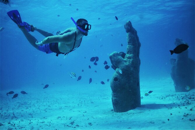 Isla Mujeres Luxury Sailing: Adults Only or Family Friendly - Isla Mujeres brings beaches, shops, and a touristy stop