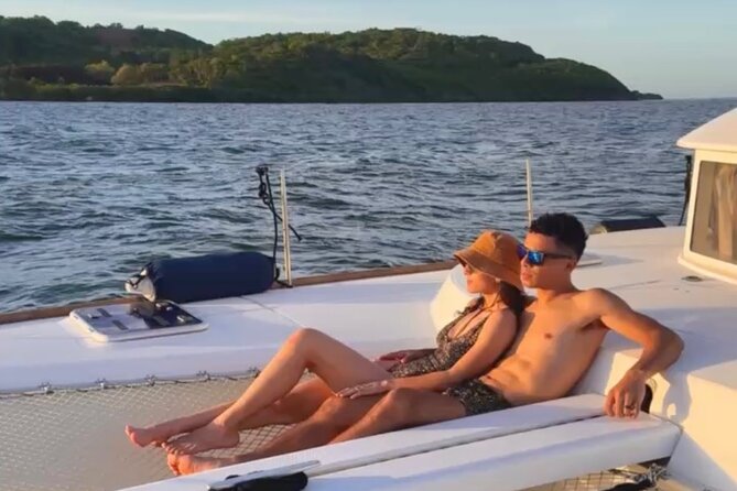Janise Sailing Afternoon Charter in Fajardo, Puerto Rico - Drinks, appetizers, and the sunset near Ramos Island