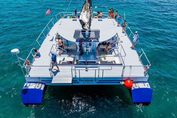 Key West Morning Snorkel Sail with Mimosas and Gourmet Breakfast - Keep watch for dolphins and frigate birds