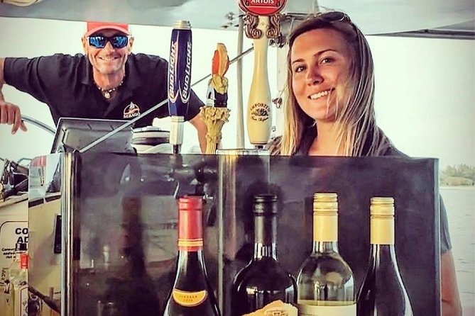 Key West Sunset Sail: Dolphin Watching, Wine, and Tapas - Booking tips for a smoother evening