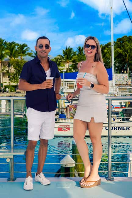 Key West: Sunset Sailing Trip with Open Bar, Food and Music - Helping with the sails and meeting the crew