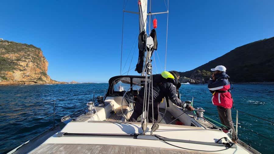Knysna Sunset Sailing Cruise with Light Dinner and Wine - Sailing through the Knysna Heads