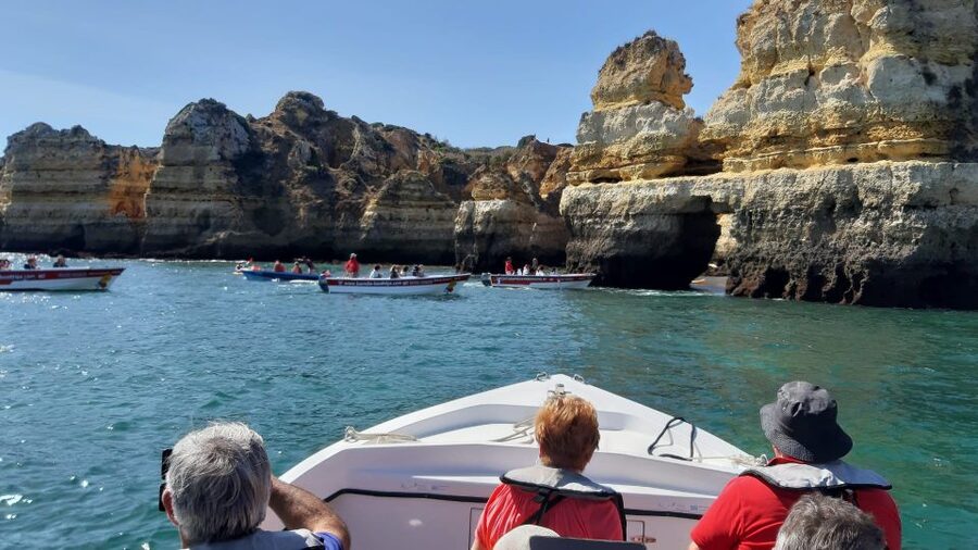 Lagos: Ponta Piedade Sail & Caves Cruise w/Portuguese Tapas - The small-boat grotto visit