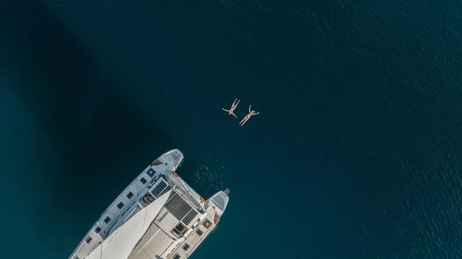 Lake Taupo: Luxury Sailing Catamaran to Māori Rock Carvings - A swim in fresh lake water