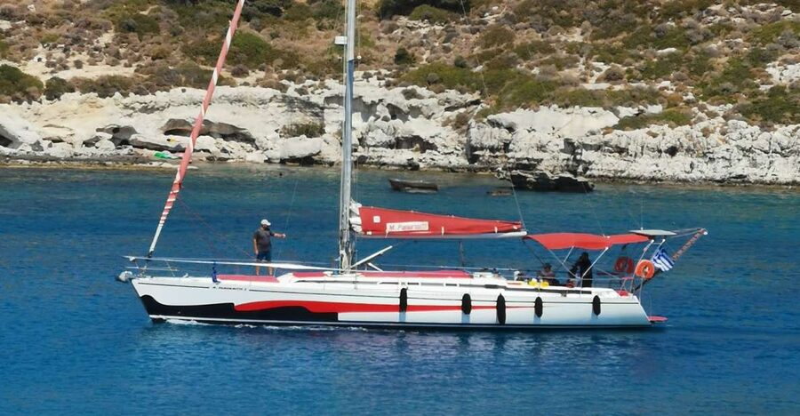 Lindos: Full-Day Private Sailing Cruise - Red Sand Beach, your first proper swim