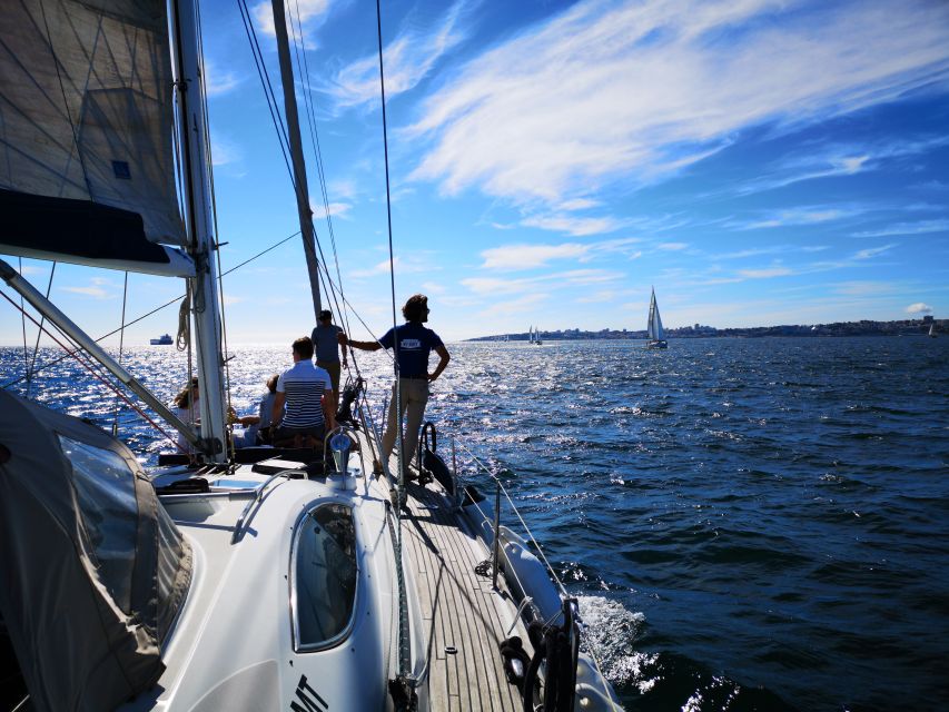 Lisbon: 2-Hour Sailing Yacht Cruise & Guided Tour w/2 drinks - Belém Tower and the April 25 Bridge from the river