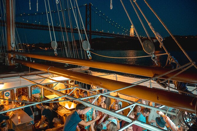 Lisbon Boat Party with Views, and Sunset Sailing - Music, drinks, and the onboard mood