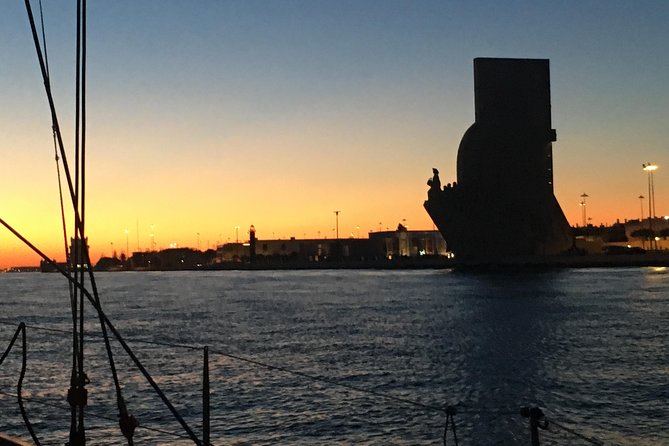 Lisbon by Night Sailing Tour with White or Rosé Wine & Light Snacks - Cristo Rei across the river