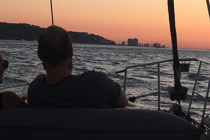 Lisbon by Night Sailing Tour with White or Rosé Wine & Light Snacks - Belém Tower and the old river gateway